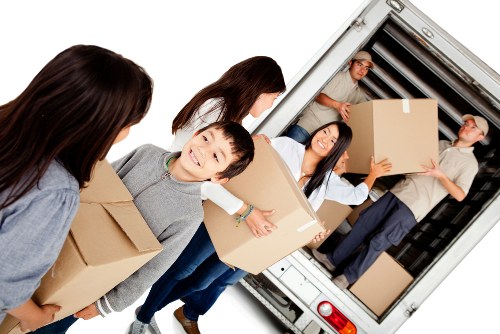 Man and van removals service working in Ilford residential street
