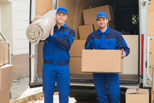 Local moving team handling packing in a flat near Ilford