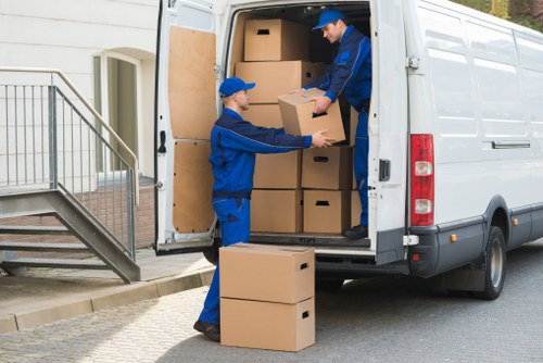 Packed business items and furniture ready for a commercial move