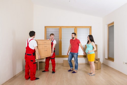Boxes and furniture prepared for a local house move in Ilford
