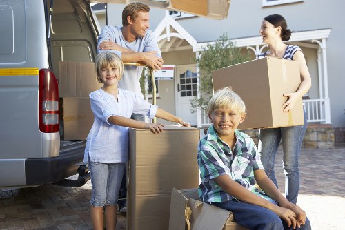 Local moving van service handling furniture and boxes in Ilford