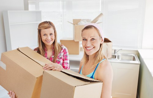Packed office furniture and IT equipment ready for transport